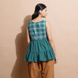 Back View of a Model wearing Bottle Green Handspun Cotton Boat Neck Tier Top