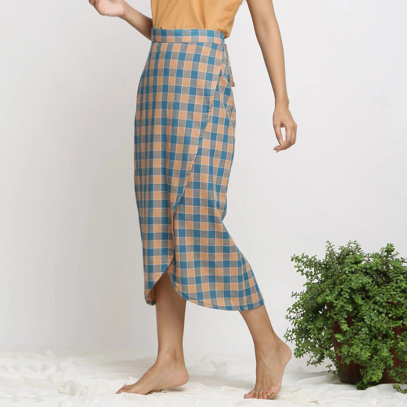 Left View of a Model wearing Bottle Green Handspun Wrap Maxi Skirt