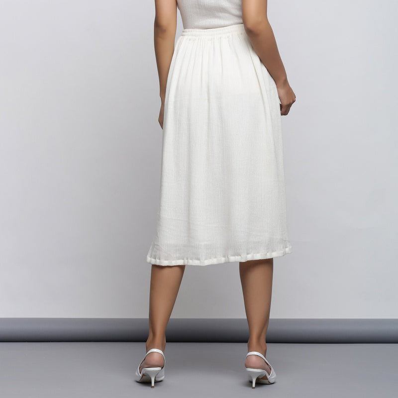 Back View of a Model wearing Off-White Crinkled Cotton Flared Skirt