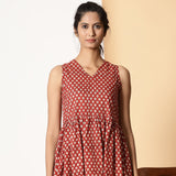 Front View of a Model wearing Brick Red Bagru Block Printed Yoke Dress