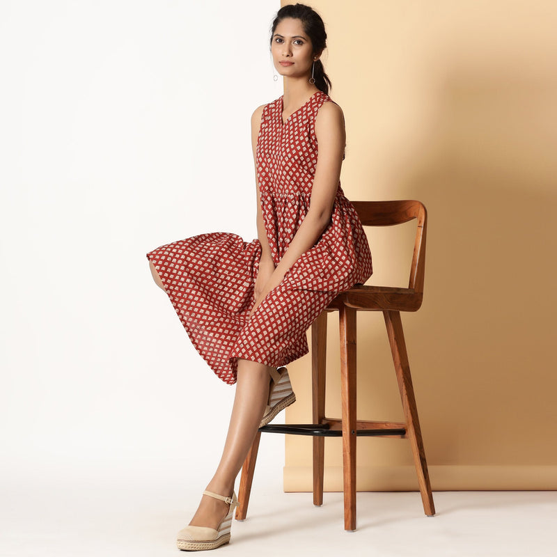 Front View of a Model wearing Brick Red Bagru Block Printed Yoke Dress