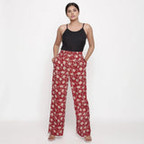 Front View of a Model wearing Brick Red Block Print Wide Straight Cotton Pant