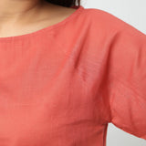 Front Detail of a Model wearing Brick Red Boat Neck Half Sleeve Cotton Top