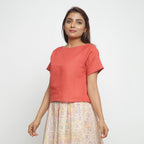 Left View of a Model wearing Brick Red Boat Neck Half Sleeve Cotton Top