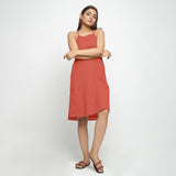 Front View of a Model wearing Brick Red Criss-Cross Cotton A-Line Dress