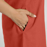 Right Detail of a Model wearing Brick Red Criss-Cross Cotton A-Line Dress