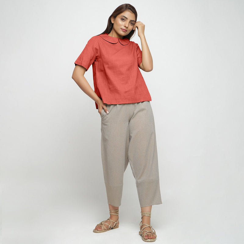 Front View of a Model wearing Brick Red Everyday Essential A-Line Top