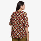 Back View of a Model wearing Brick Red Block Printed Button-Down Shirt