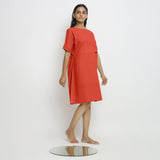 Right View of a Model wearing Brick Red Handspun Vegetable Dyed Yoked Dress