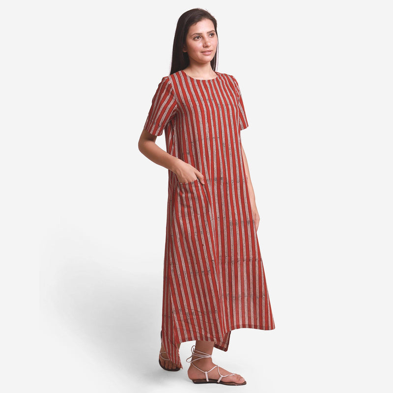 Front View of a Model wearing Brick Red Block Printed Maxi Dress
