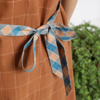 Close View of a Model wearing Brown Handspun V-Neck Shift Dress
