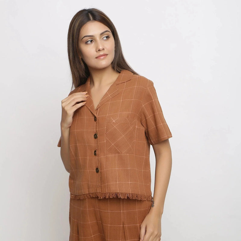 Left View of a Model wearing Handspun Brown Fringe Button-Down Shirt