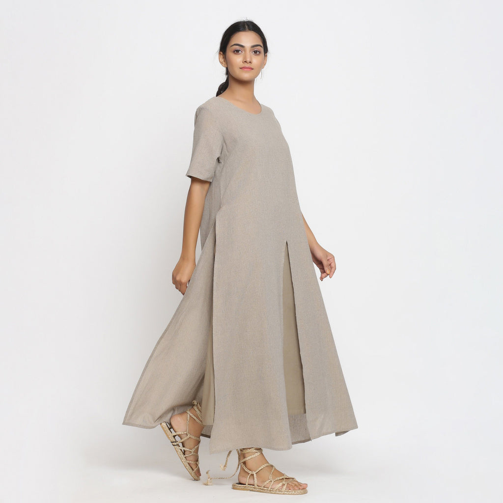 Right View of a Model wearing Brown Cotton Flax Strap Sleeve A-Line Dress