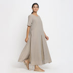 Right View of a Model wearing Brown Cotton Flax Strap Sleeve A-Line Dress