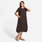 Front View of a Model wearing Brown Cotton Welt Pocket Shift Dress