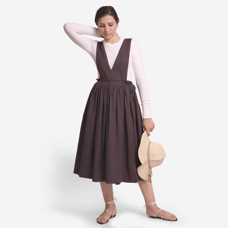 Front View of a Model wearing Brown Deep Neck Pinafore Midi Wrap Dress