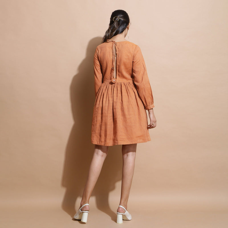 Back View of a Model wearing Brown Handspun Solid Loose Fit Dress