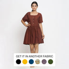 Front View of a Model wearing Brown Cotton Button-Down Gathered Dress