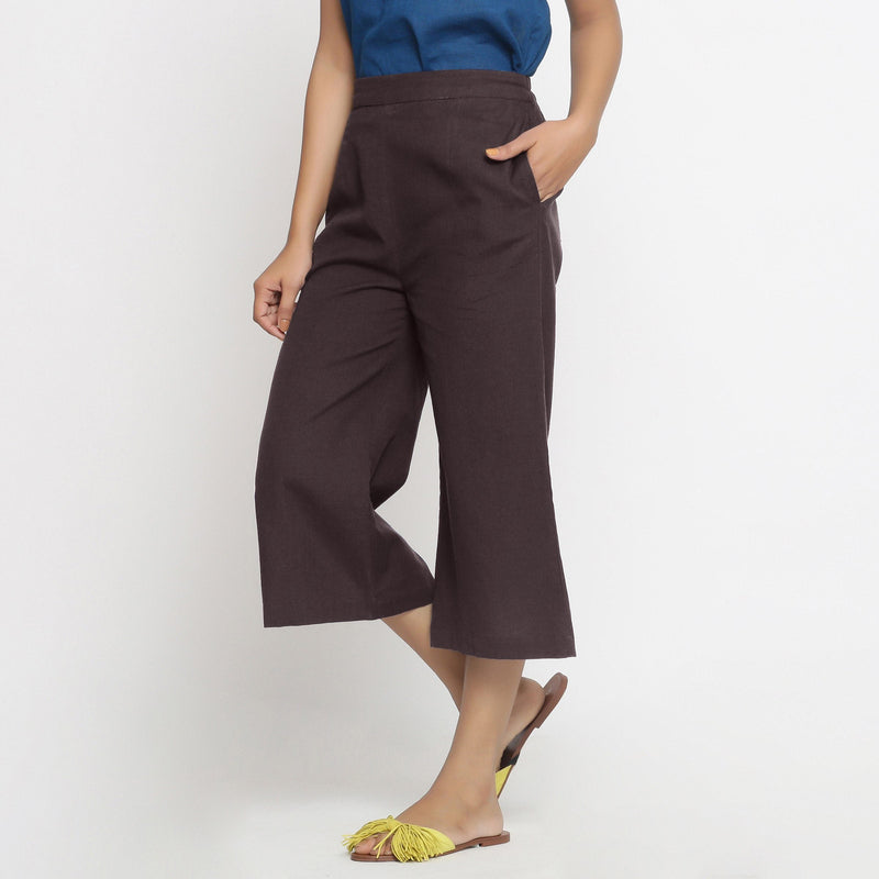 Left View of a Model wearing Brown Mid-Rise Cotton Flax Culottes