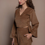 Left Detail of a Model wearing Camel Brown Cotton Velvet Full Sleeve Wrap Crop Top