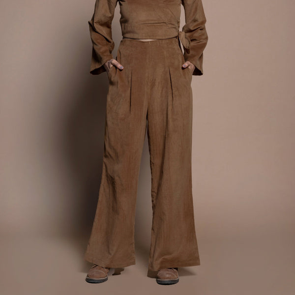 Front View of a Model wearing Camel Brown Cotton Velvet Elasticated Wide Legged Pant