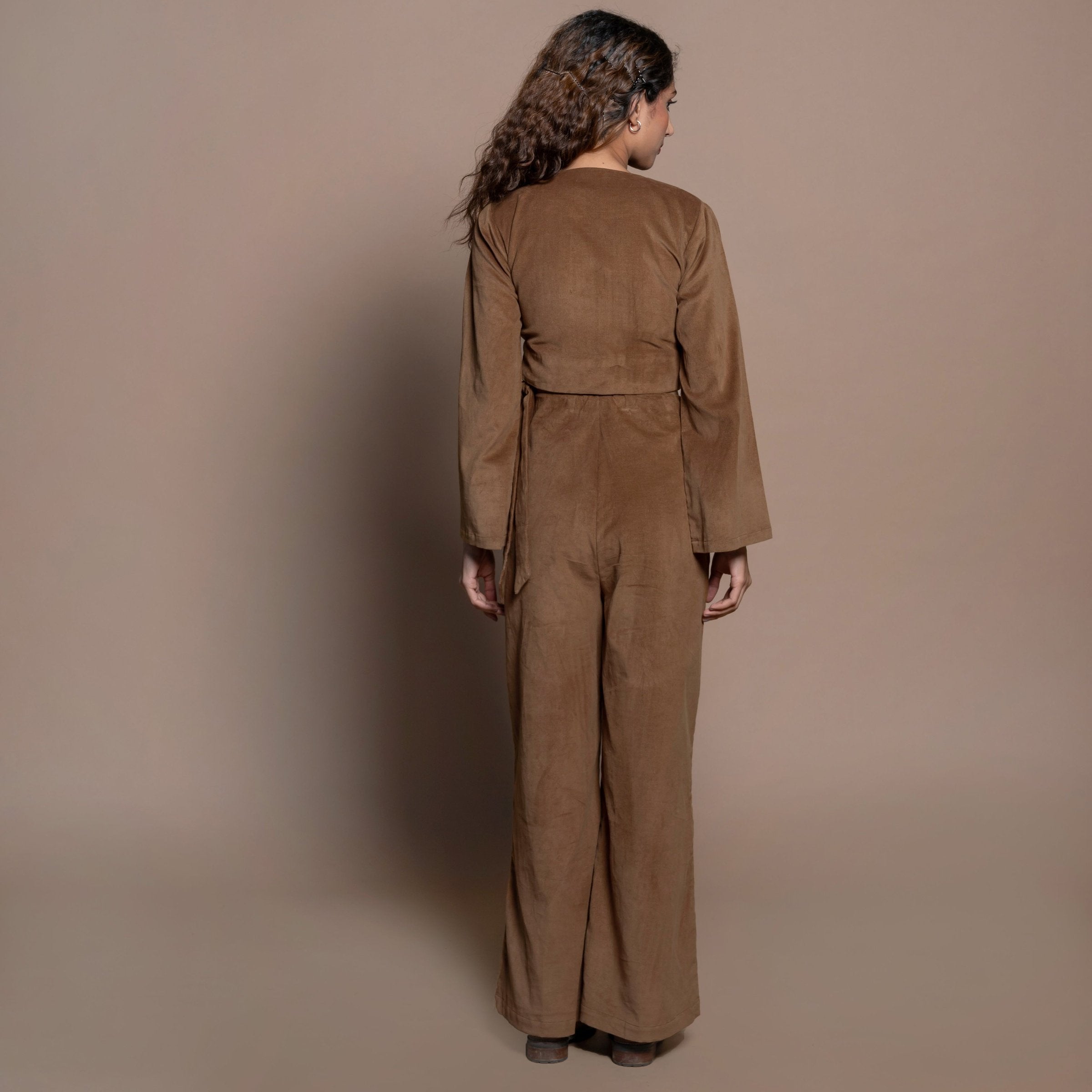 Back View of a Model wearing Camel Brown Cotton Velvet Elasticated Wide Legged Pant