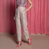 Left View of a Model wearing Champagne Cotton Chanderi Elasticated High-Rise Pant