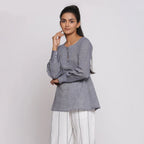 Left View of a Model wearing Charcoal Grey Cotton Flared Tunic Top