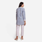 Back View of a Model wearing Sanganeri Checks Block Printed Shawl Collar Cotton Shrug