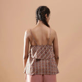 Back View of a Model wearing Kalamkari Strappy Tiered Camisole Top