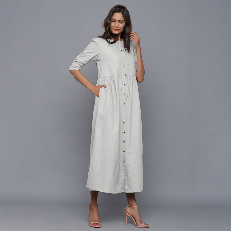 Right View of a Model wearing Cloudy Grey Cotton Flannel Gathered Dress