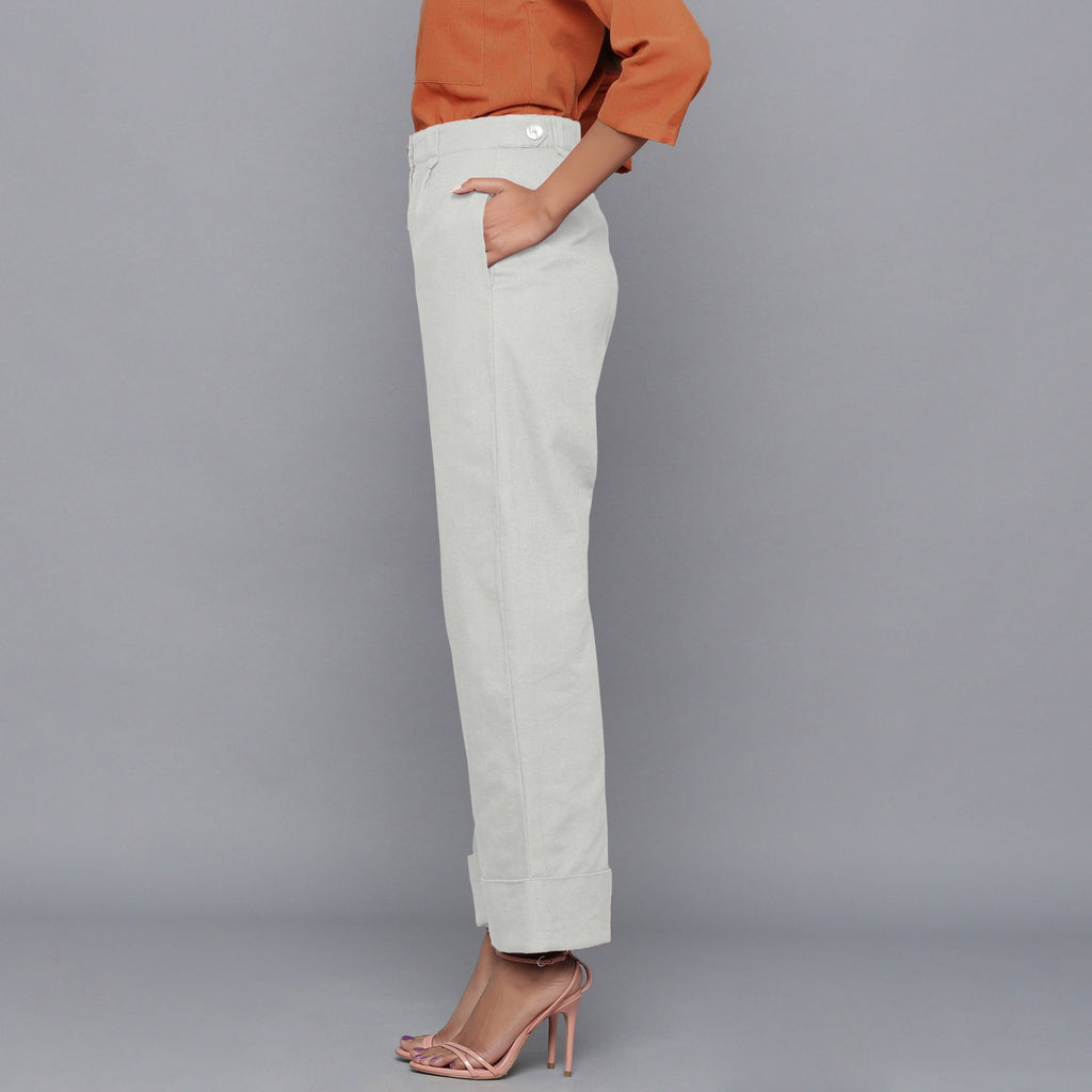 Left View of a Model wearing Cloudy Grey Flannel Rolled-Up Straight Pant
