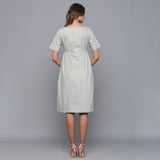 Back View of a Model wearing Cloudy Grey Paneled Cotton Flannel Dress