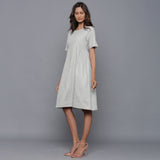 Left View of a Model wearing Cloudy Grey Paneled Cotton Flannel Dress