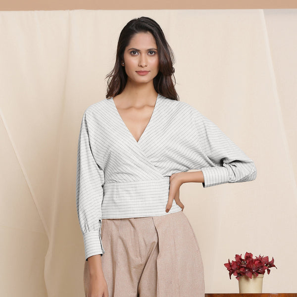 Front View of a Model wearing Cloudy Grey Striped Surplice Neck Blouson Top