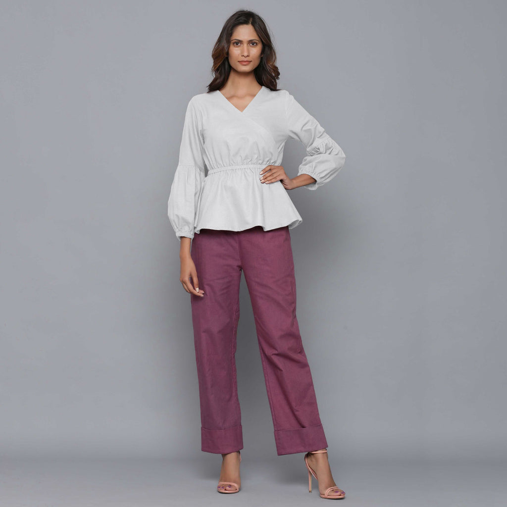 Front View of a Model wearing Cloudy Grey V-Neck Flannel Peplum Top