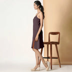 Left View of a Model wearing Cocoa Brown Cotton Flax Strappy Slit Dress