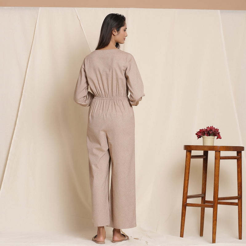 Back View of a Model wearing Dusk Brown Cotton Elasticated Surplice Neck Overalls Jumpsuit