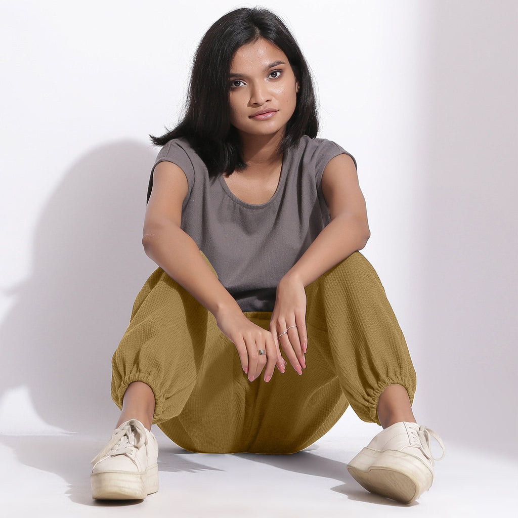 Front View of a Model wearing Comfy Olive Green Cotton Waffle Jogger Pants