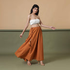 Right View of a Model wearing Convertible 6-Way Rust Sandstone Tie-Dye Cotton Skirt Dress