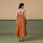 Back View of a Model wearing Convertible 6-Way Rust Sandstone Tie-Dye Cotton Skirt Dress