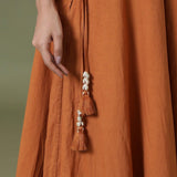Close View of a Model wearing Convertible 6-Way Rust Sandstone Tie-Dye Cotton Skirt Dress