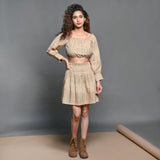 Front View of a Model wearing Convertible Beige Handwoven Cotton Elasticated Shirred Top Skirt