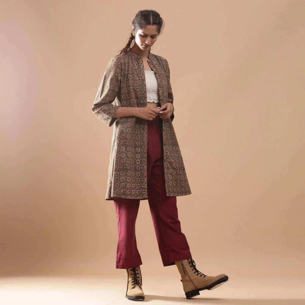 Right View of a Model wearing Convertible Warm Kalamkari Short Overlay Dress