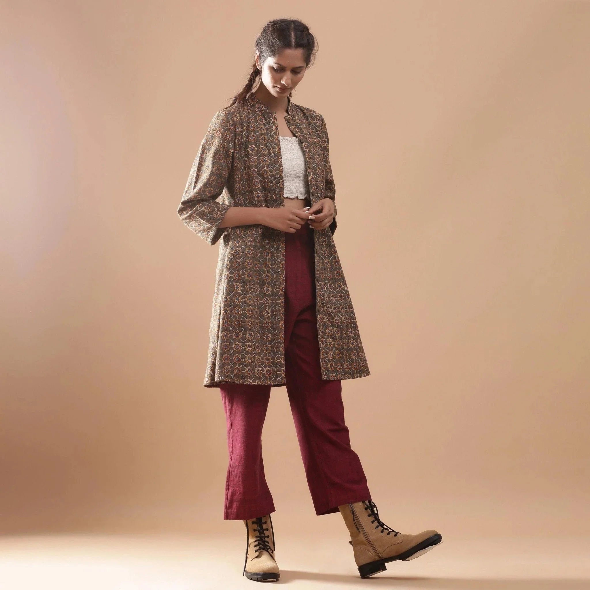 Right View of a Model wearing Convertible Warm Kalamkari Short Overlay Dress