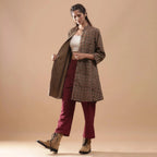 Front View of a Model wearing Convertible Warm Kalamkari Short Overlay Dress