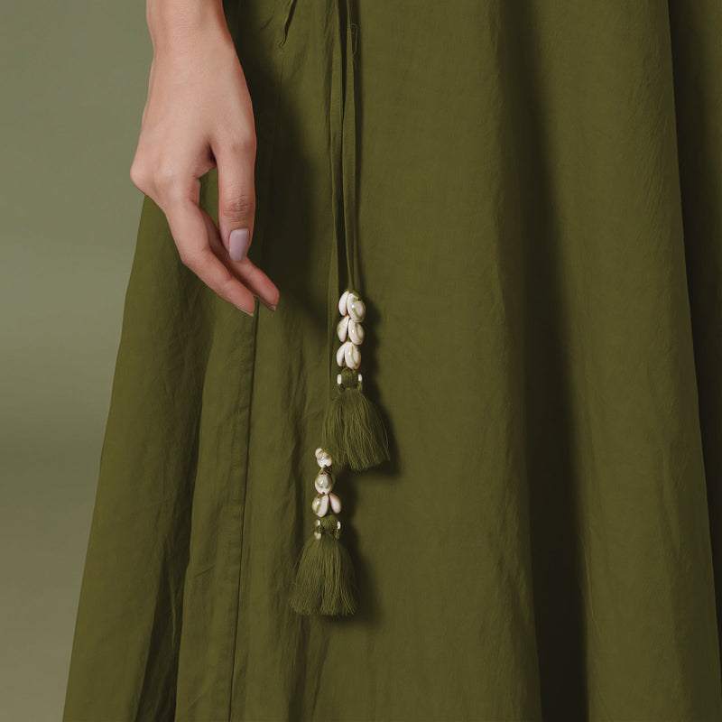 Close View of a Model wearing Convertible Olive Green Shibori Tie Dye 6-Way Skirt Dress