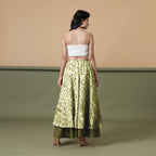 Back View of a Model wearing Convertible Olive Green Shibori Tie Dye 6-Way Skirt Dress