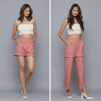 Front View of a Model wearing Pink Flannel Convertible Pant Shorts