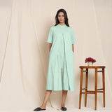 Front View of a Model wearing Cotton Aqua Box Pleated Jumpsuit